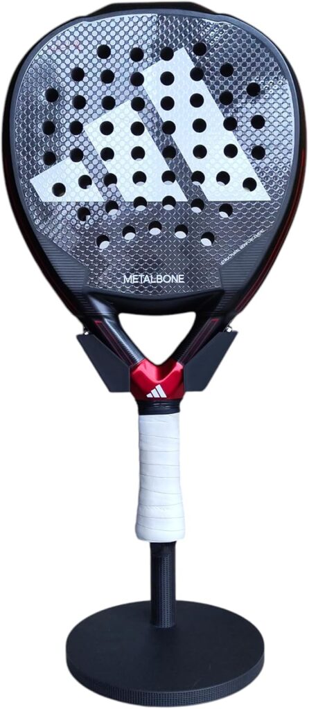 Padel racket stand displaying multiple colorful padel rackets neatly organized in a modern home office.